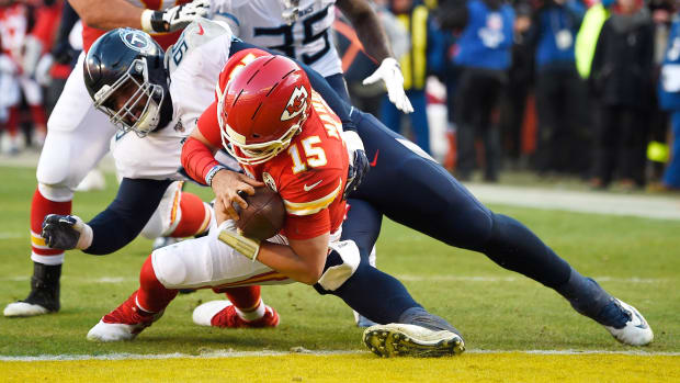 Kansas City Chiefs quarterback Patrick Mahomes (15) scores a touchdown during the second quarter of the AFC Championship game against the Tennessee Titans at Arrowhead Stadium Sunday, Jan. 19, 2020 in Kansas City, Mo. An19715